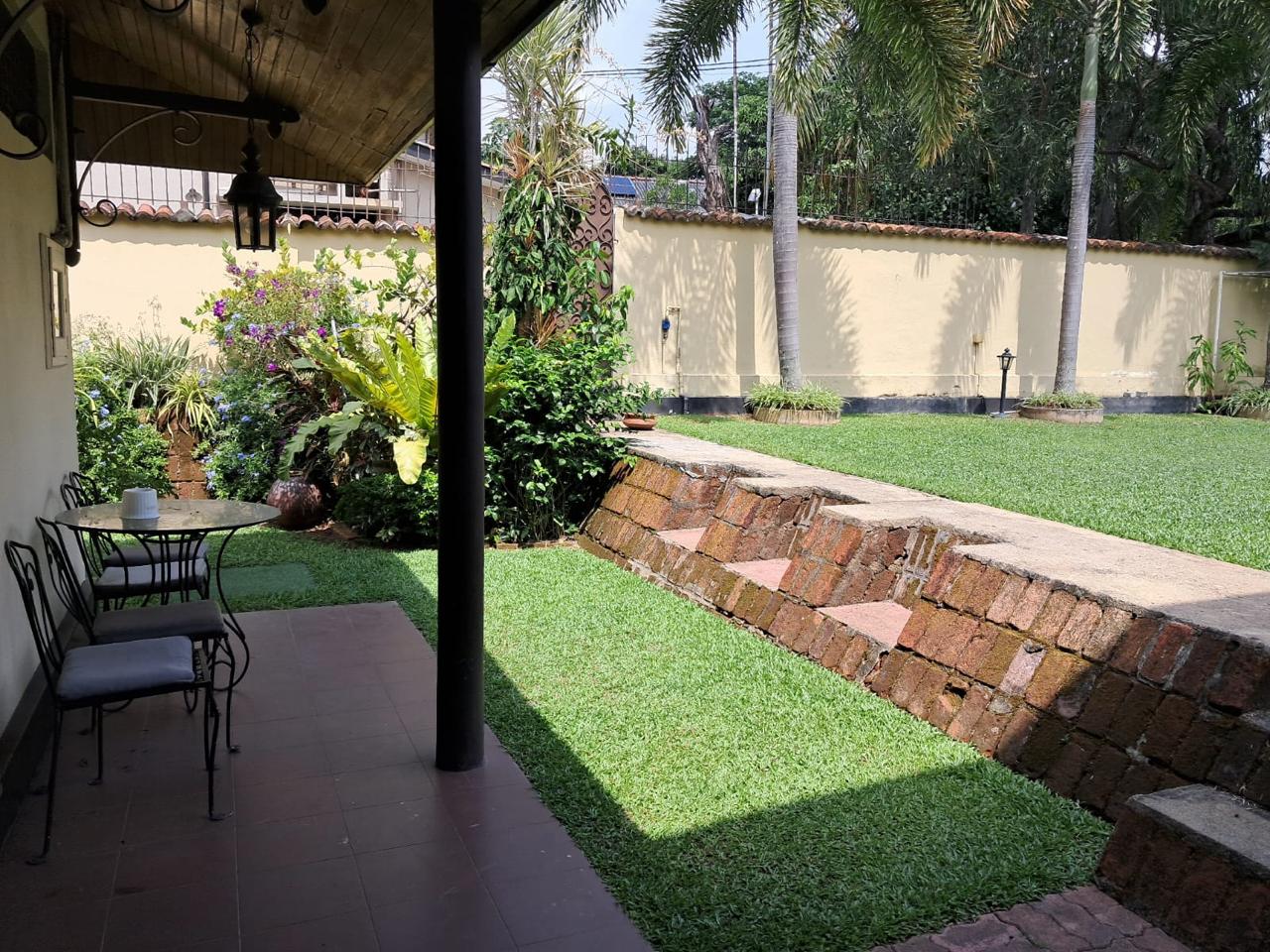 Lush Tropical Foliage & Stone Pavers